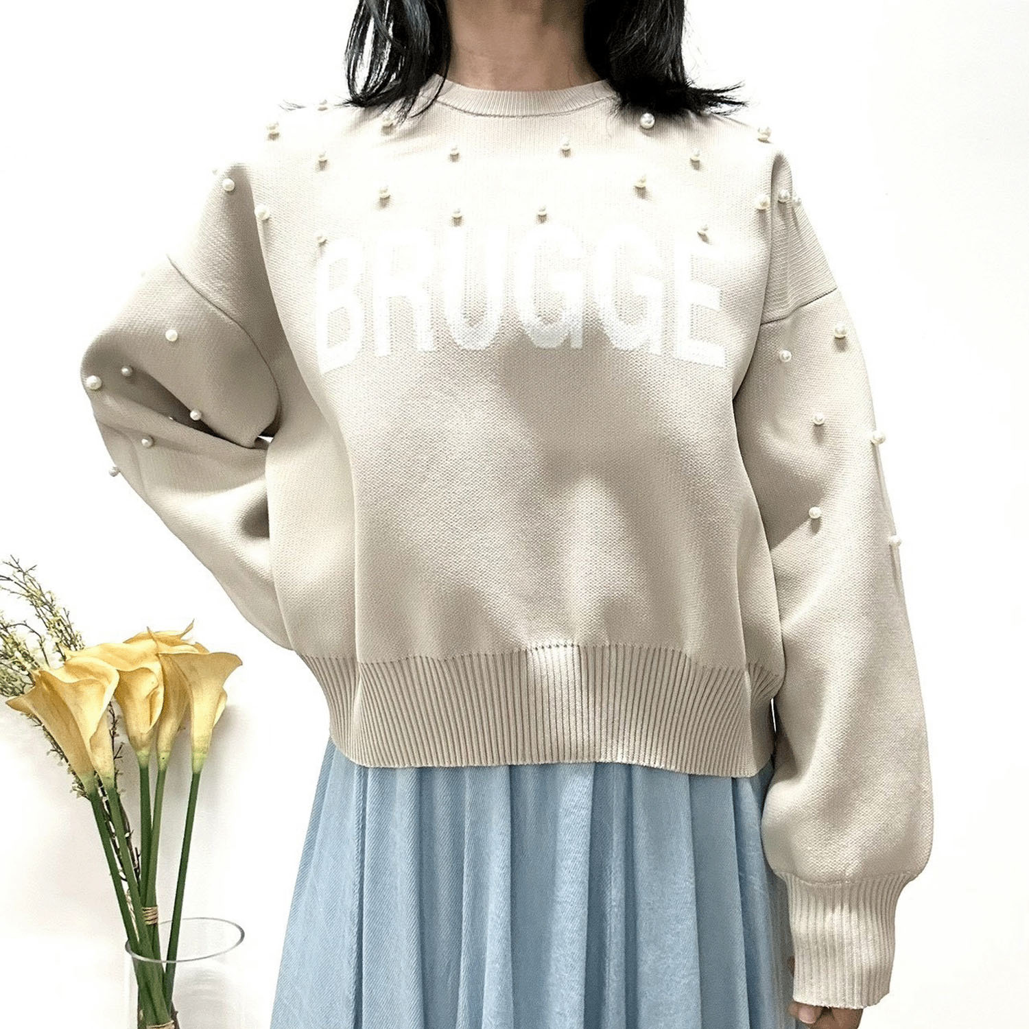 MONiLE パール付きロゴジャカードニット - 画像1